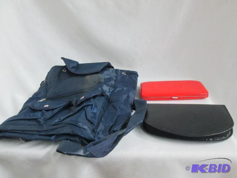 lot 38 image: Navy Backpack, 20 pc. Manicure Set & Womens Red Wallet