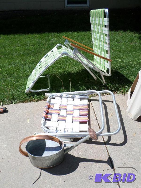 lot 135 image: lawn chairs and watering can...