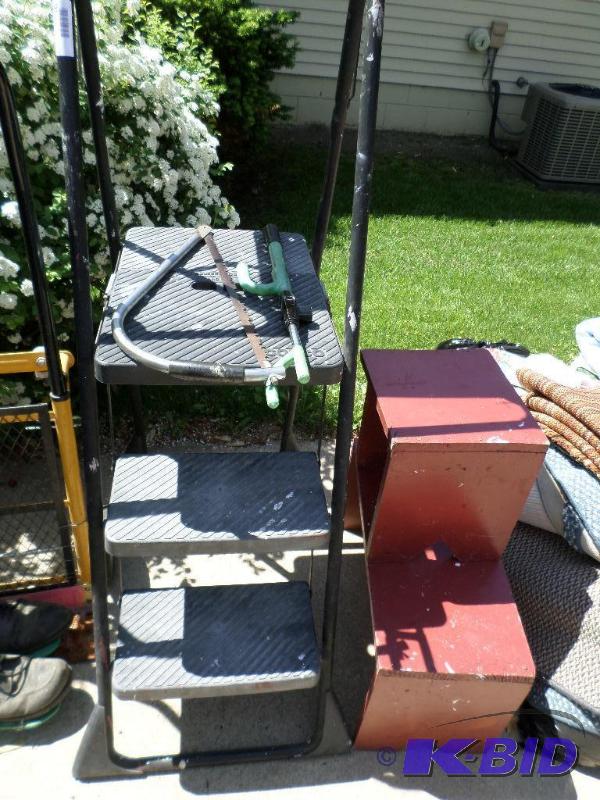 lot 141 image: cosco step ladder, saw and steering...