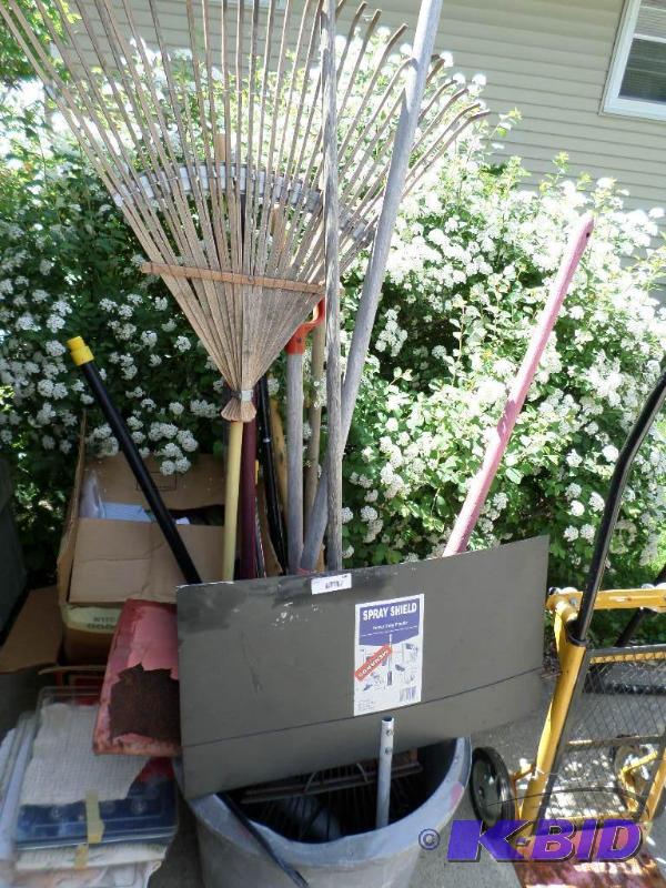 lot 143 image: tub lawn and gardent tools, shovels...