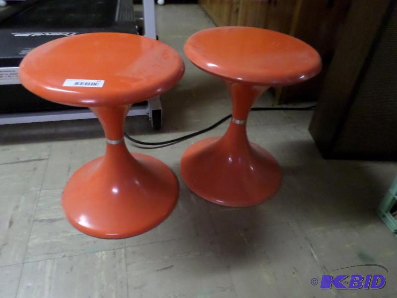 lot 51 image: Two orange stands or stools...