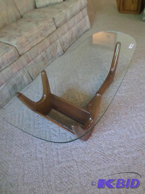 lot 6 image: glass coffee table...