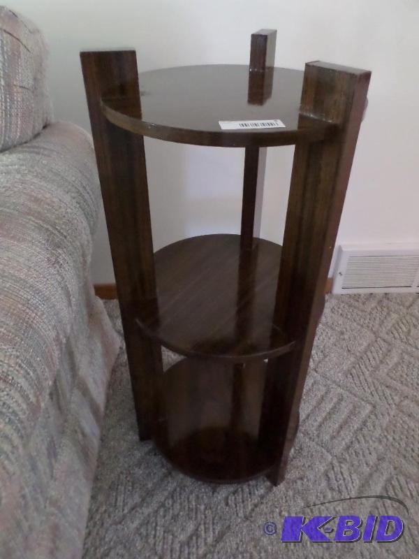 lot 8 image: cylinder shelved end table...