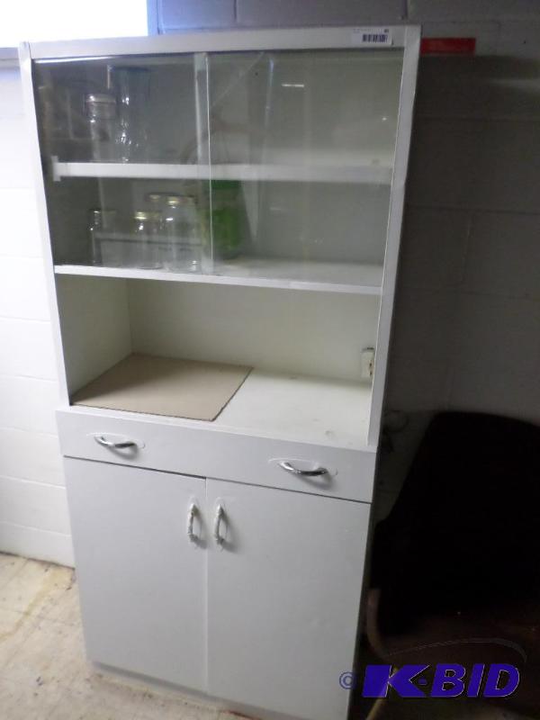 lot 81 image: metal cabinet, mason jars, glass va...
