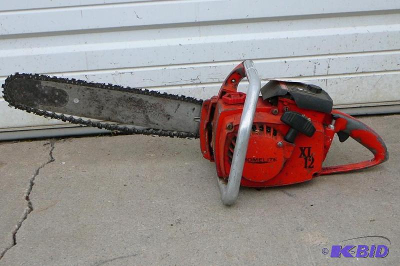 lot 27 image: Homelite chain saw XL 20 works Sold...