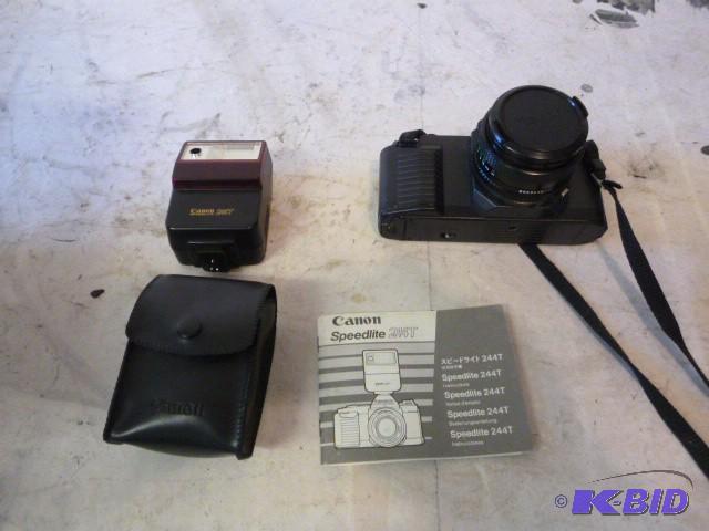 lot 121 image: Canon Speed Lite T-50 Camera...