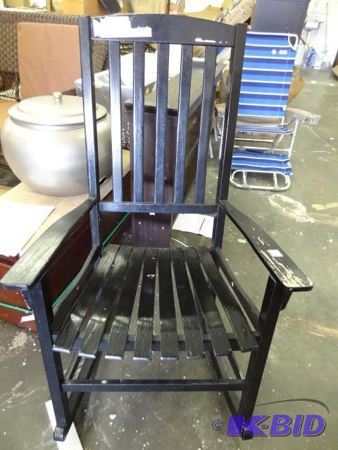 lot 117 image: Wood rocking chair. Leftarm has wea...