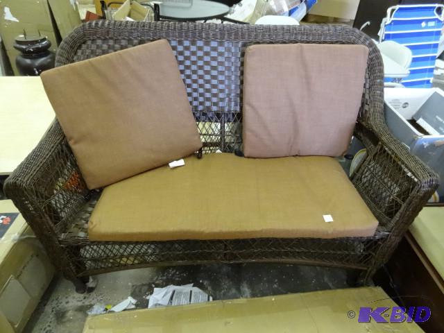 lot 269 image: Outdoor wicker bench with 2 cushion...