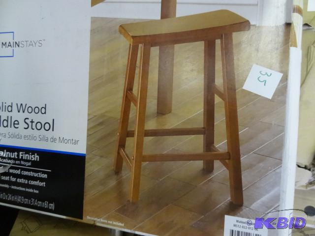lot 35 image: Solid wood tall saddle stool. Main ...