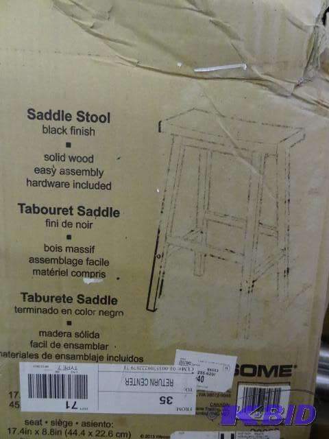 lot 36 image: 20089 saddle stool. Black finish...