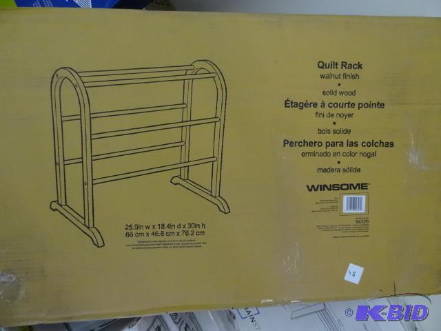 lot 45 image: Walnut finish quilt rack...