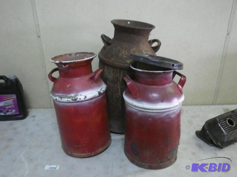 lot 102 image: 3 milk cans, one lid...