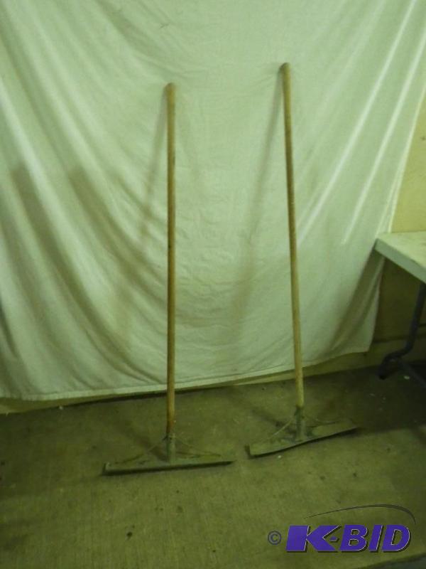 lot 54 image: 2 cement rakes...