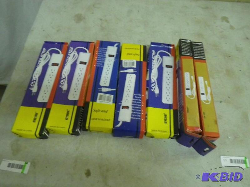 lot 55 image: 7 new power strips...