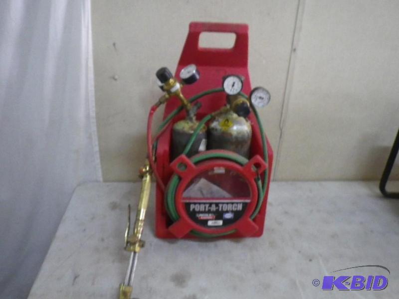 lot 58 image: Lincoln Porta torch set...