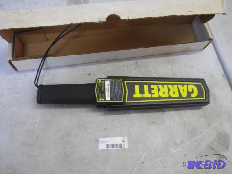 lot 66 image: Garrett Hand held metal detector, w...
