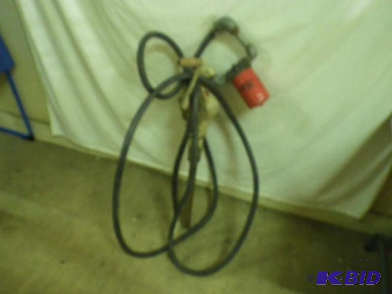 lot 79 image: barrel pump...