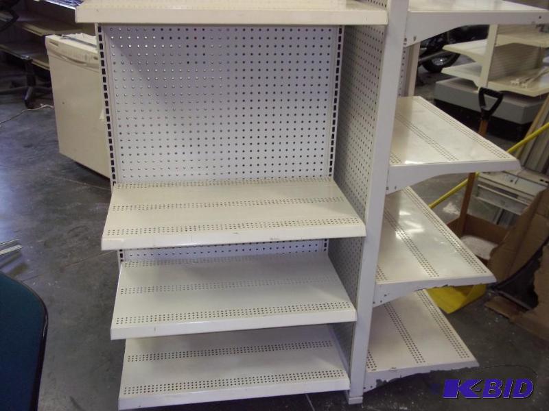 lot 8 image: 4 Sided Display Shelf with 16 Shelv...