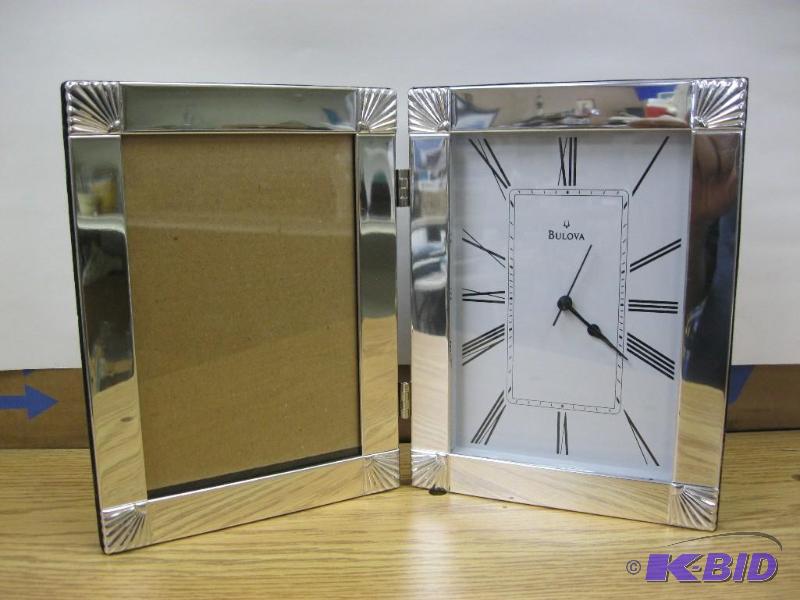 lot 130 image: Bulova&nbspClock And Picture Frame...