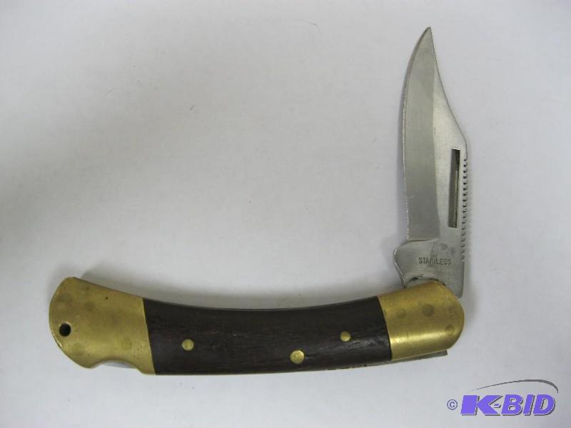 lot 233 image: Folding Wood Handle Pocket Knife...