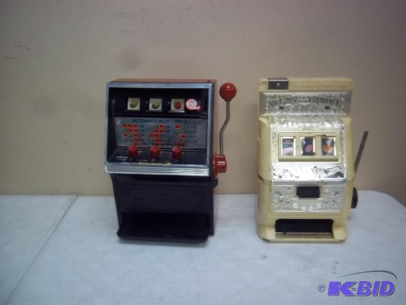 lot 33 image: Pair Of Vintage Toy Slot Machines N...