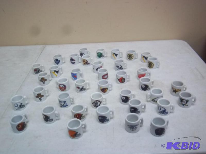 lot 74 image: Sports Mini Mug Lot...
