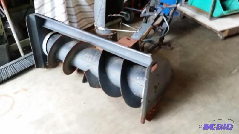 lot 18 image: Snow blower attachment for a MTD, s...
