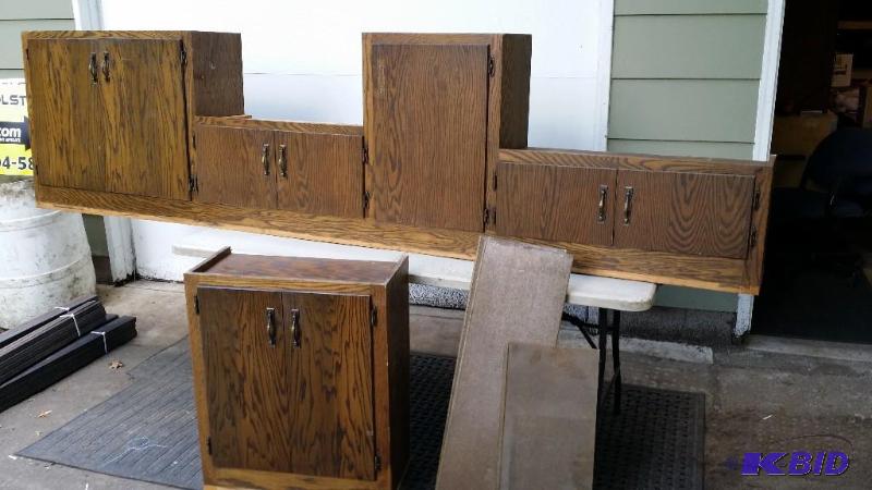 lot 19 image: All wood cabinets, great for a gara...