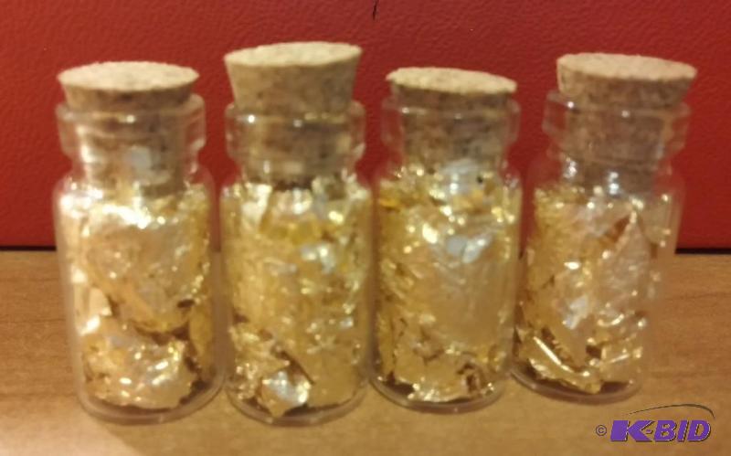 4 VIALS OF GOLD FLAKES...