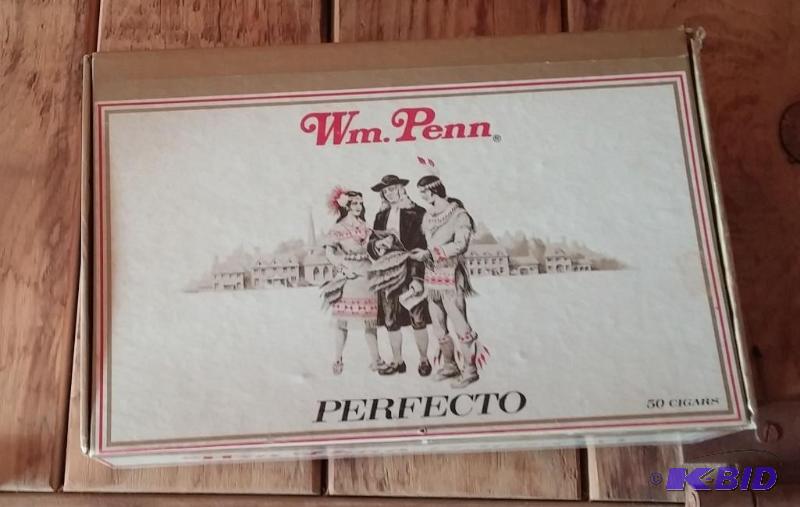 Vintage cigar box with bottle and c...