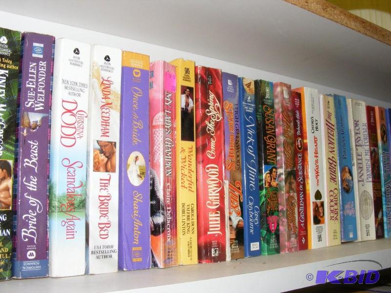 Shelf full of books, see pictures f...