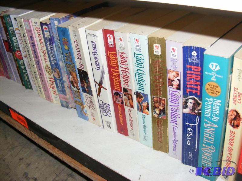 Shelf full of books, see pictures f...