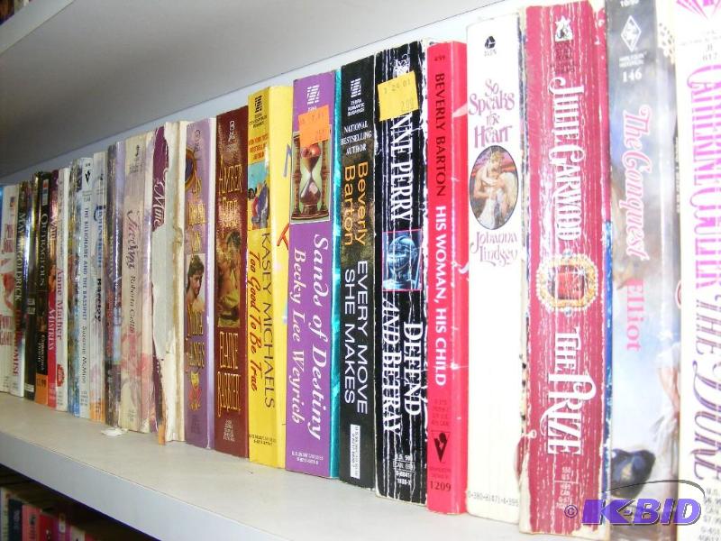 Shelf full of books, see pictures f...