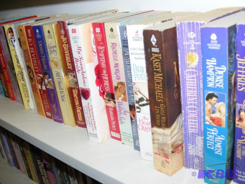 Shelf full of books, see pictures f...