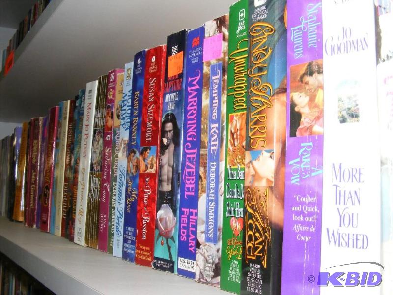 Shelf full of books, see pictures f...