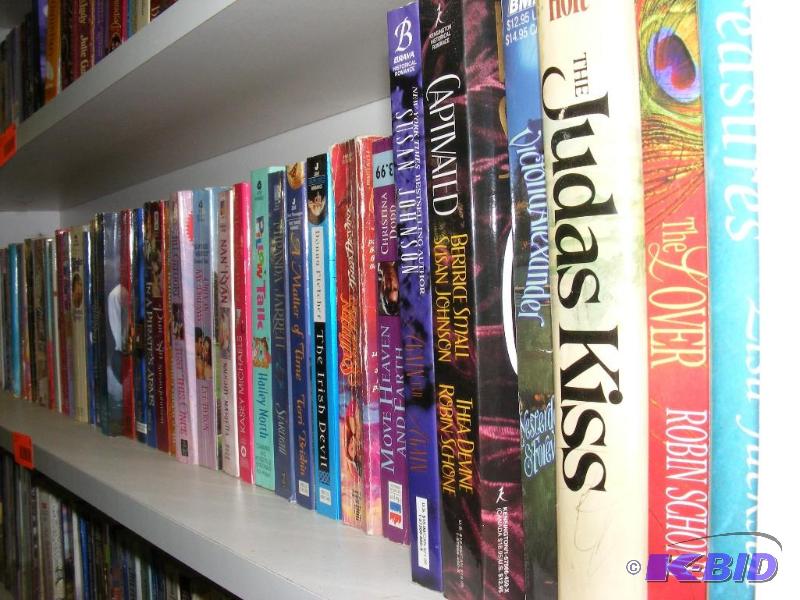 Shelf full of books, see pictures f...