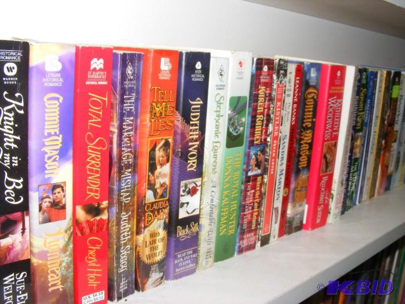 Shelf full of books, see pictures f...