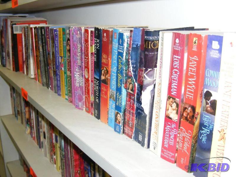 Shelf full of books, see pictures f...