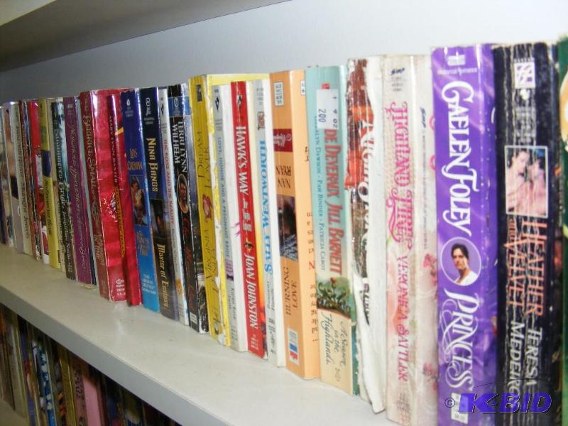 Shelf full of books, see pictures f...