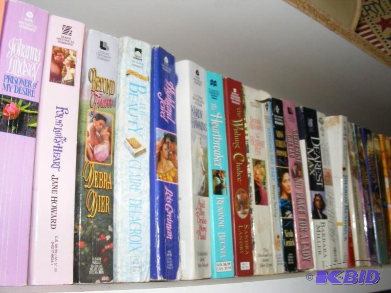Shelf full of books, see pictures f...