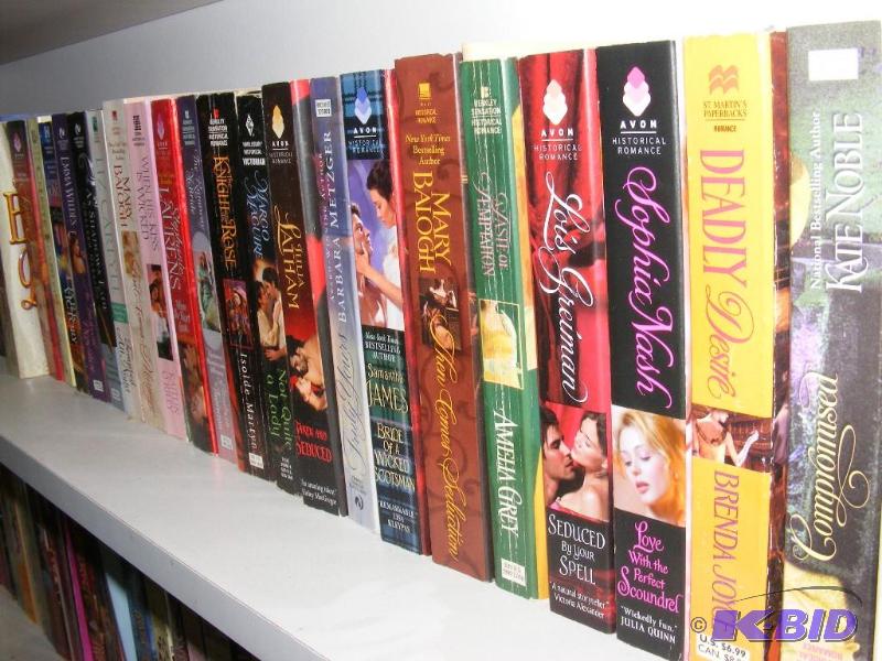 Shelf full of books, see pictures f...