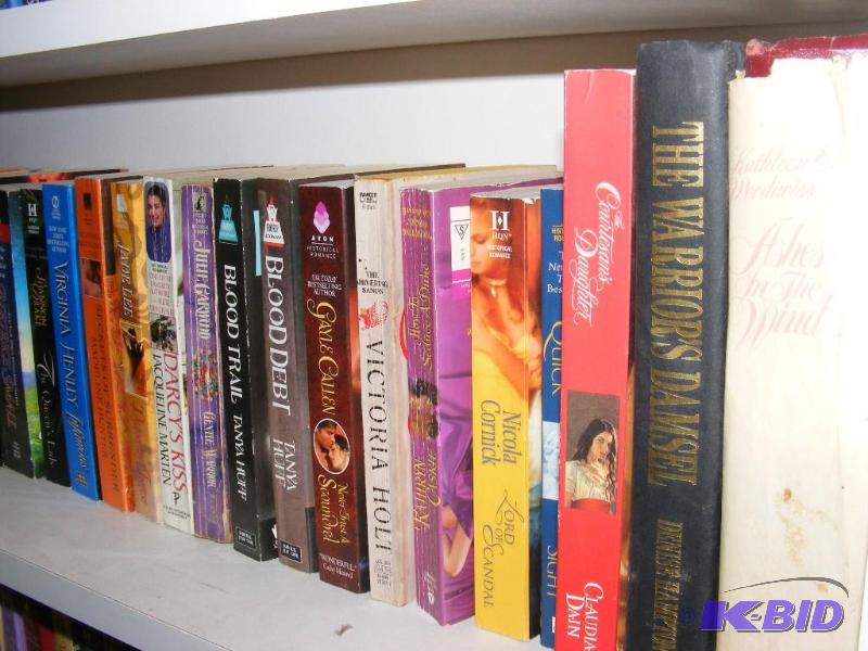 Shelf full of books, see pictures f...
