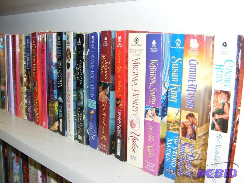 Shelf full of books, see pictures f...