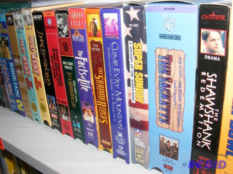 Shelf of VCR Video Tapes, Various M...