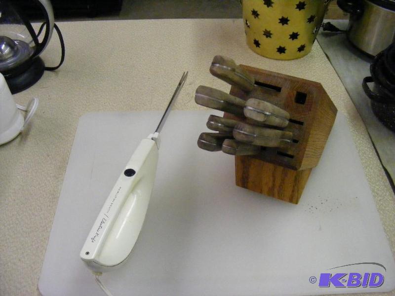Butcher Block with knives and the e...