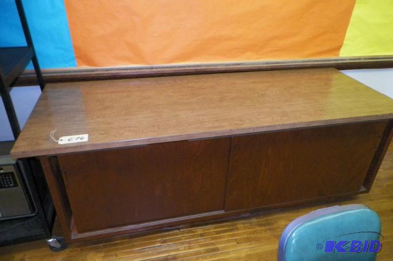 lot 676 image: Wood Cabinet (Room 206)