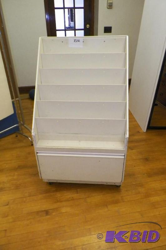 lot 822 image: Book Rack on Wheels