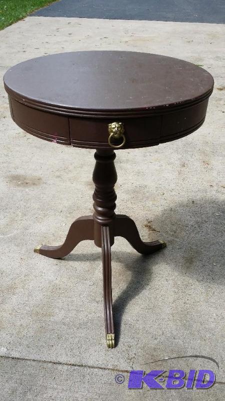 Small side table painted brown with...