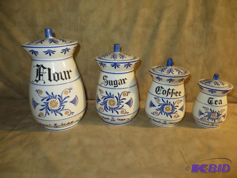 4 piece Cannister set. Mainly blue ...