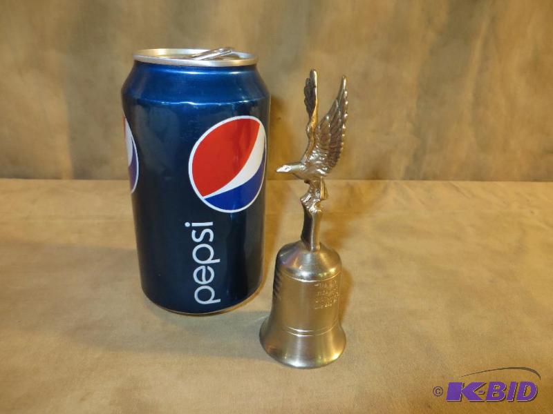 A BRASS EAGLE WITH RAISED WINGS STA...